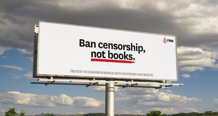 a white billboard that says